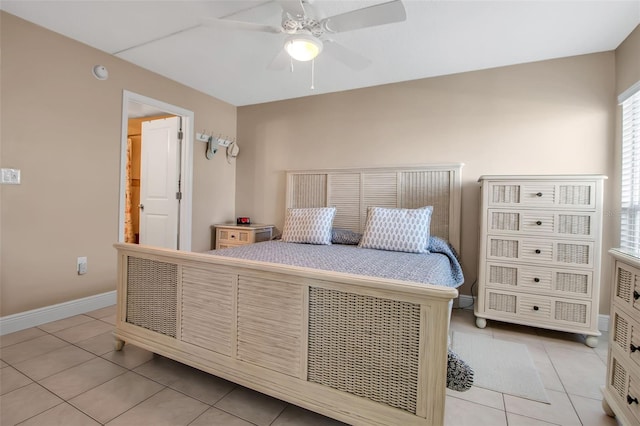 10423 Waterbird Way Unit 10423, Bradenton, FL 34209 - bedroom with light tile patterned floors, baseboards, and ceiling fan