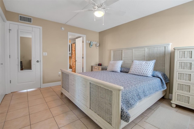 10423 Waterbird Way Unit 10423, Bradenton, FL 34209 - bedroom featuring light tile patterned flooring, baseboards, and a ceiling fan