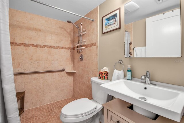 10423 Waterbird Way Unit 10423, Bradenton, FL 34209 - full bath featuring a sink, tiled shower, and toilet