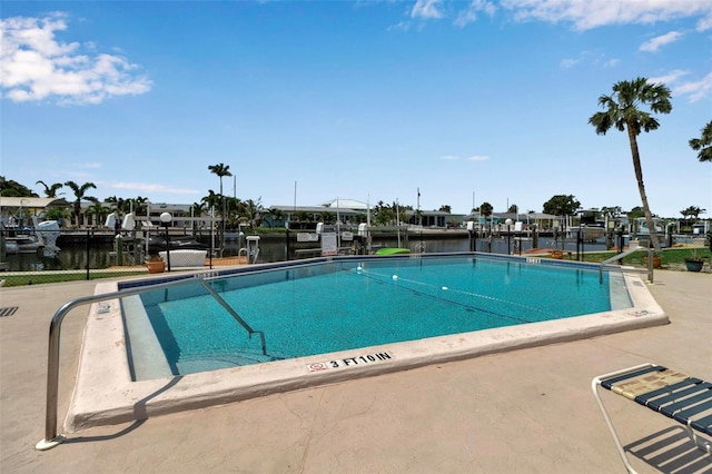10423 Waterbird Way Unit 10423, Bradenton, FL 34209 - community pool with boat lift and a dock