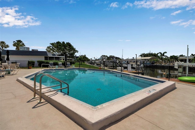 10423 Waterbird Way Unit 10423, Bradenton, FL 34209 - community pool featuring fence and a patio area