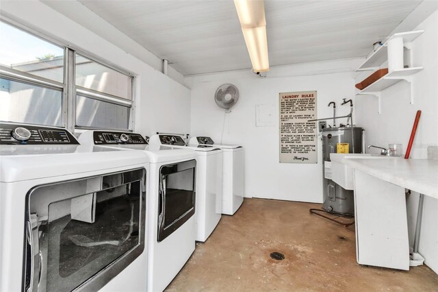 10423 Waterbird Way Unit 10423, Bradenton, FL 34209 - laundry room with washing machine and clothes dryer and water heater