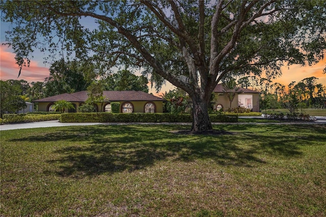4225 Ulman Ave, North Port, FL 34286 - view of front of house featuring a lawn