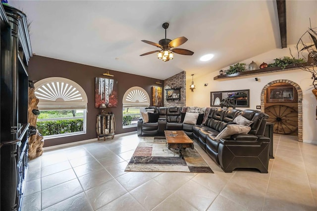 4225 Ulman Ave, North Port, FL 34286 - living area with vaulted ceiling, ceiling fan, light tile patterned floors, and baseboards