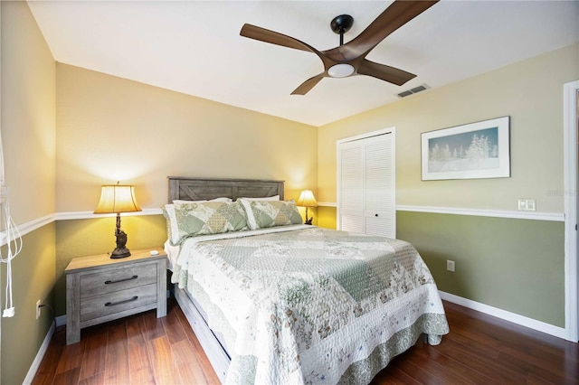 4225 Ulman Ave, North Port, FL 34286 - bedroom featuring baseboards, dark wood-type flooring, a closet, and ceiling fan