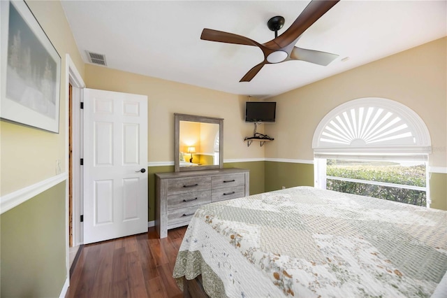4225 Ulman Ave, North Port, FL 34286 - bedroom featuring dark wood-type flooring, ceiling fan, and baseboards