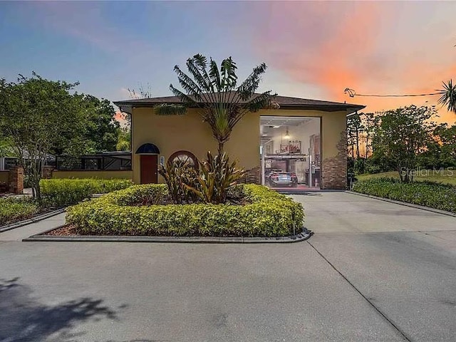 4225 Ulman Ave, North Port, FL 34286 - view of front of house featuring stucco siding