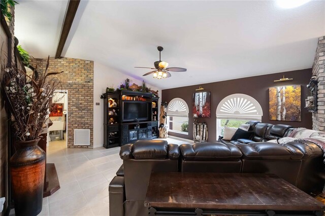 4225 Ulman Ave, North Port, FL 34286 - living room featuring lofted ceiling, light tile patterned floors, and a ceiling fan