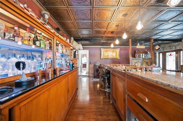 4225 Ulman Ave, North Port, FL 34286 - community bar area with an ornate ceiling and dark wood-style flooring