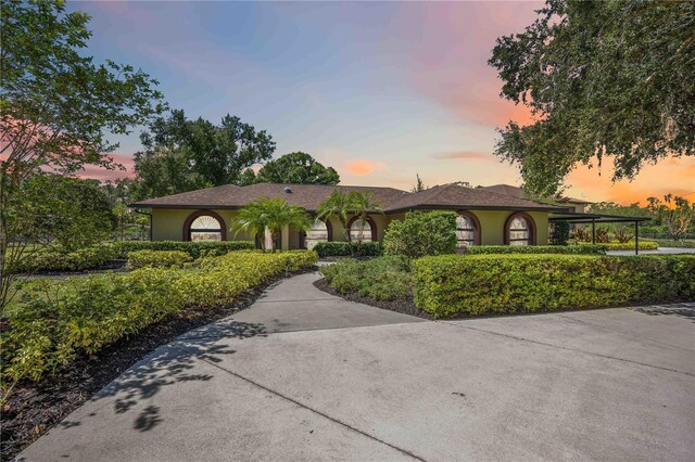 4225 Ulman Ave, North Port, FL 34286 - view of front of house with stucco siding