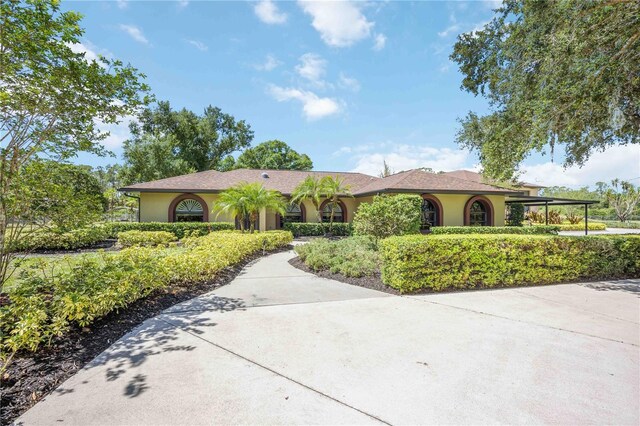 4225 Ulman Ave, North Port, FL 34286 - view of front of house featuring stucco siding