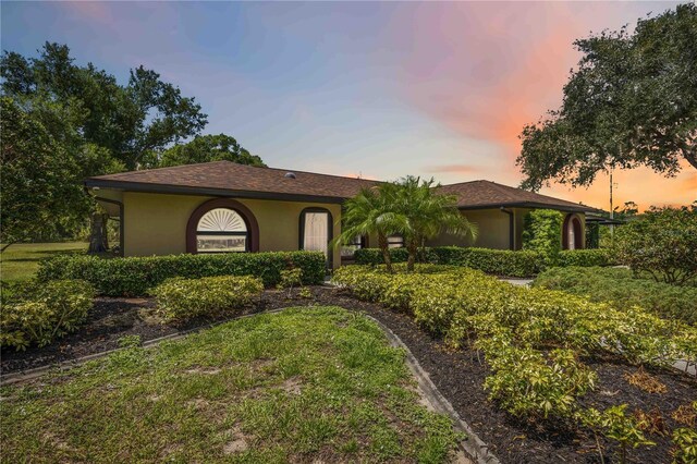 4225 Ulman Ave, North Port, FL 34286 - view of front of house featuring stucco siding