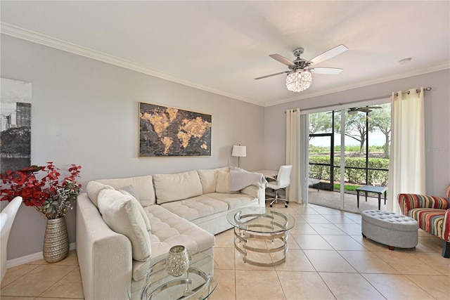 living area featuring crown molding, light tile patterned flooring, ceiling fan, and baseboards