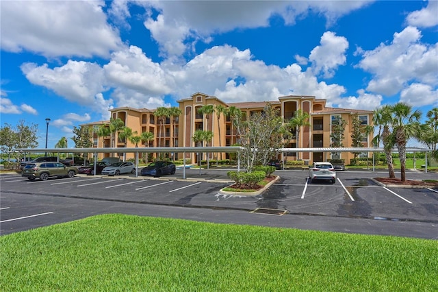 view of partially covered parking lot