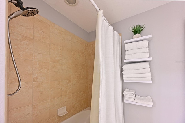 bathroom featuring shower / tub combo
