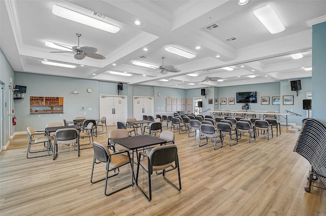 dining room with coffered ceiling, a ceiling fan, light wood-type flooring, recessed lighting, and beam ceiling