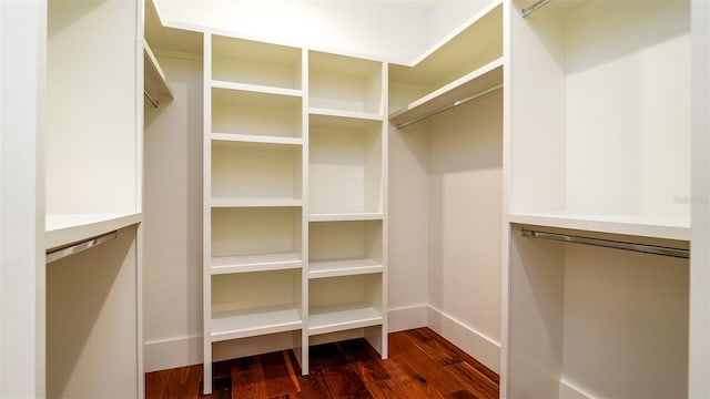 603 Emerald Ln, Holmes Beach, FL 34217 - spacious closet featuring dark wood finished floors