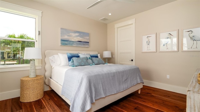 603 Emerald Ln, Holmes Beach, FL 34217 - bedroom with wood finished floors, baseboards, recessed lighting, and ceiling fan