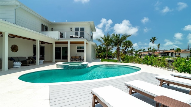 603 Emerald Ln, Holmes Beach, FL 34217 - view of swimming pool featuring an outdoor hangout area, a patio area, a pool with connected hot tub, a ceiling fan, and outdoor dining area