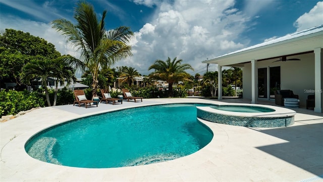603 Emerald Ln, Holmes Beach, FL 34217 - view of pool featuring a patio, a ceiling fan, and a pool with connected hot tub