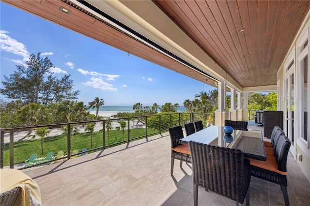 view of patio featuring a water view