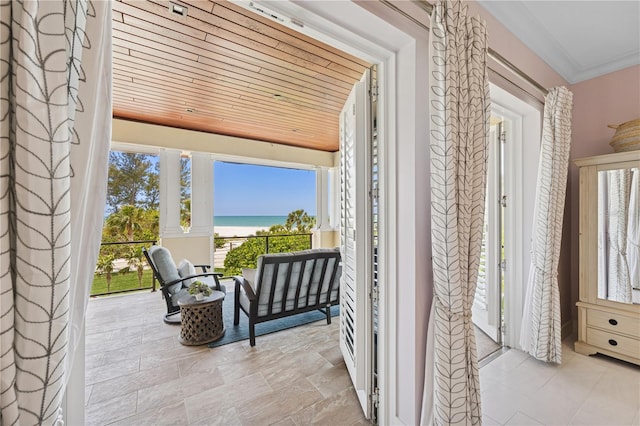balcony featuring a water view