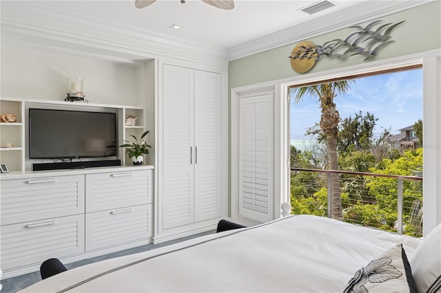 bedroom featuring crown molding and a ceiling fan