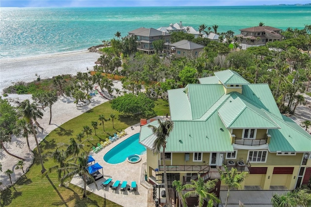 aerial view of a large body of water and a pool area