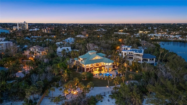 aerial overview of property's location featuring a nearby body of water