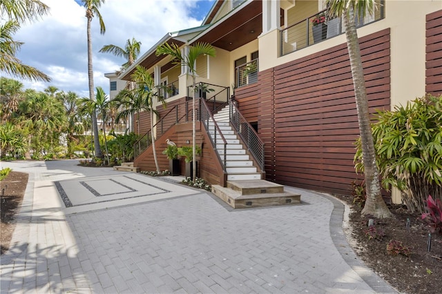view of building exterior featuring stairs