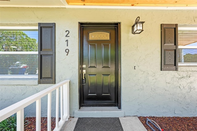 219 Vermont Ave, Saint Cloud, FL 34769 - view of exterior entry with stucco siding