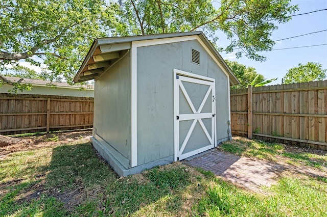 219 Vermont Ave, Saint Cloud, FL 34769 - view of shed featuring a fenced backyard
