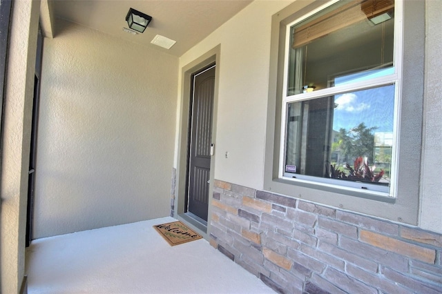 7311 64th St E, Palmetto, FL 34221 - entrance to property with stucco siding