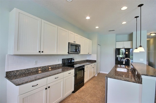 7311 64th St E, Palmetto, FL 34221 - kitchen featuring appliances with stainless steel finishes, a sink, tasteful backsplash, hanging light fixtures, and recessed lighting