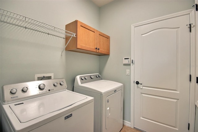 7311 64th St E, Palmetto, FL 34221 - clothes washing area featuring separate washer and dryer and cabinet space