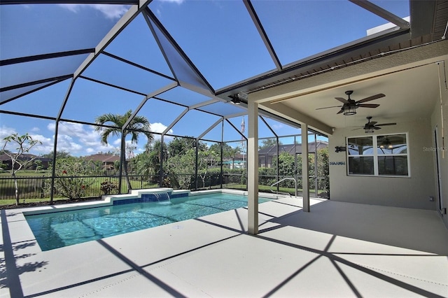 7311 64th St E, Palmetto, FL 34221 - view of swimming pool featuring a patio area, ceiling fan, glass enclosure, and a jacuzzi