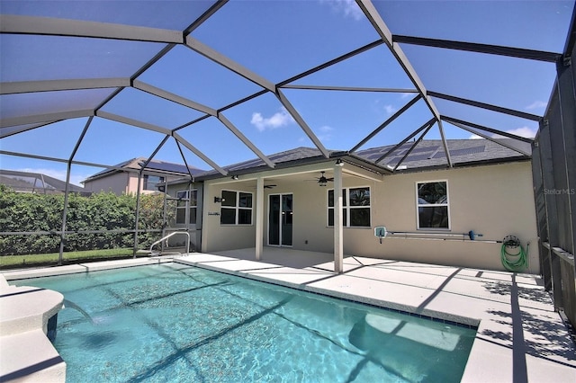 7311 64th St E, Palmetto, FL 34221 - swimming pool featuring ceiling fan, a patio area, and a lanai