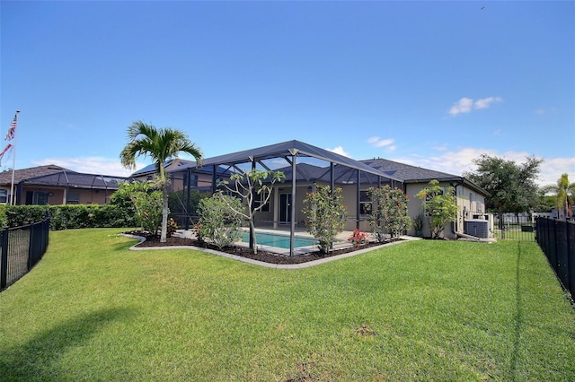 7311 64th St E, Palmetto, FL 34221 - rear view of house with glass enclosure