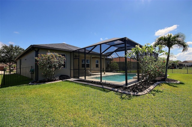 7311 64th St E, Palmetto, FL 34221 - back of property featuring stucco siding and a lanai