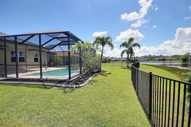 7311 64th St E, Palmetto, FL 34221 - view of yard with a water view, a lanai, and a patio