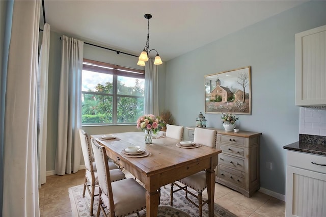 7311 64th St E, Palmetto, FL 34221 - dining space featuring light tile patterned floors and baseboards