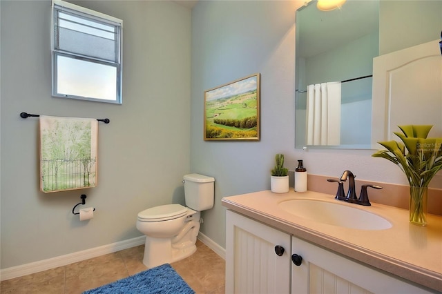 7311 64th St E, Palmetto, FL 34221 - full bathroom featuring toilet, baseboards, vanity, tile patterned flooring, and a shower with shower curtain