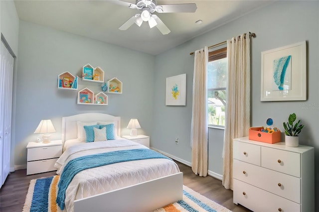 7311 64th St E, Palmetto, FL 34221 - bedroom featuring wood finished floors, baseboards, and ceiling fan