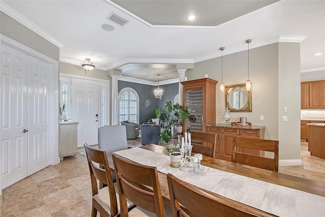 6539 Flycatcher Ln, Lakewood Ranch, FL 34202 - dining space with decorative columns, ornamental molding, and recessed lighting