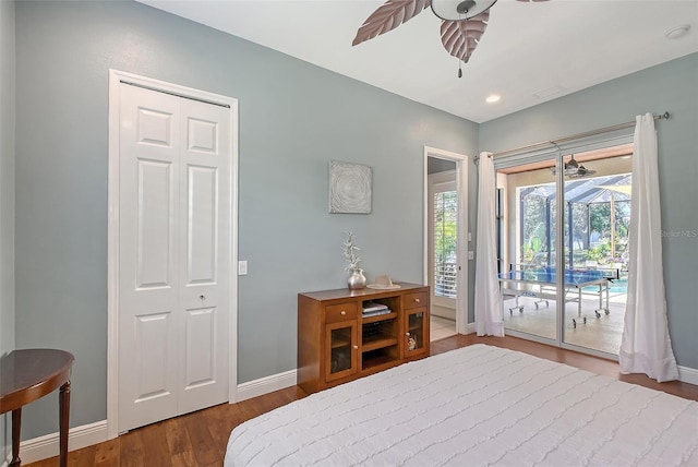 6539 Flycatcher Ln, Lakewood Ranch, FL 34202 - bedroom with access to outside, wood finished floors, baseboards, and recessed lighting