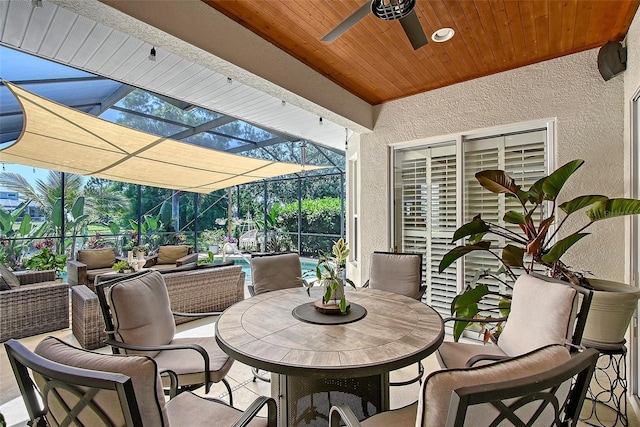 6539 Flycatcher Ln, Lakewood Ranch, FL 34202 - view of patio with ceiling fan, glass enclosure, and outdoor lounge area