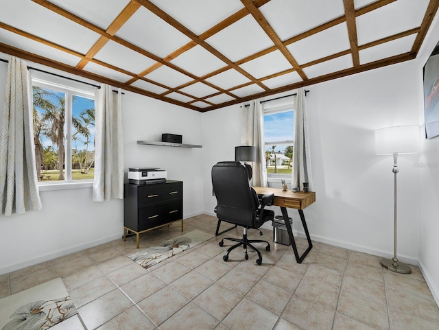 office space featuring baseboards and light tile patterned flooring