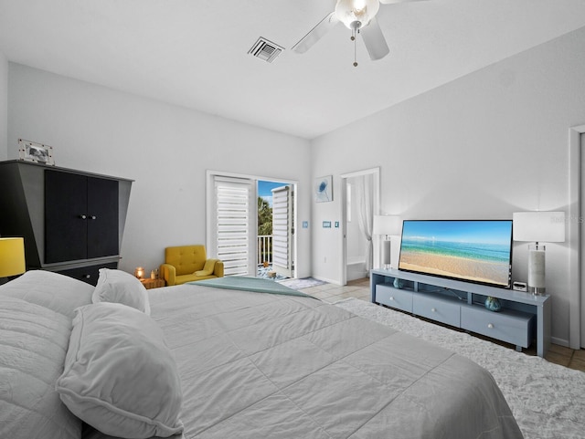 tiled bedroom featuring access to exterior and ceiling fan