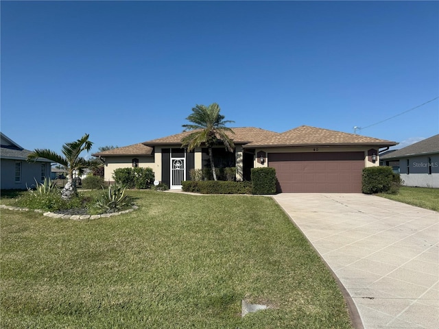 40 Mariner Ln, Rotonda West, FL 33947 - ranch-style house with an attached garage, concrete driveway, a front lawn, and stucco siding