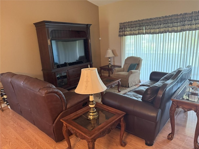 40 Mariner Ln, Rotonda West, FL 33947 - living room featuring light wood-style floors and healthy amount of natural light